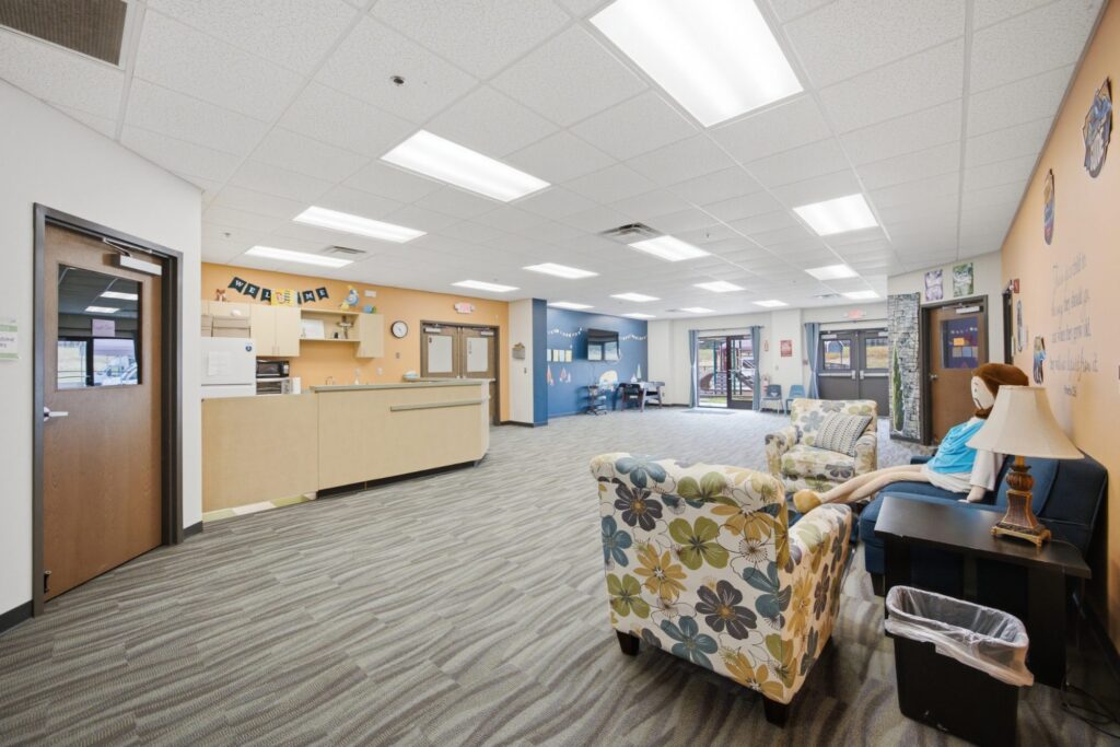 Kid Zone check-in desk and lounge seating