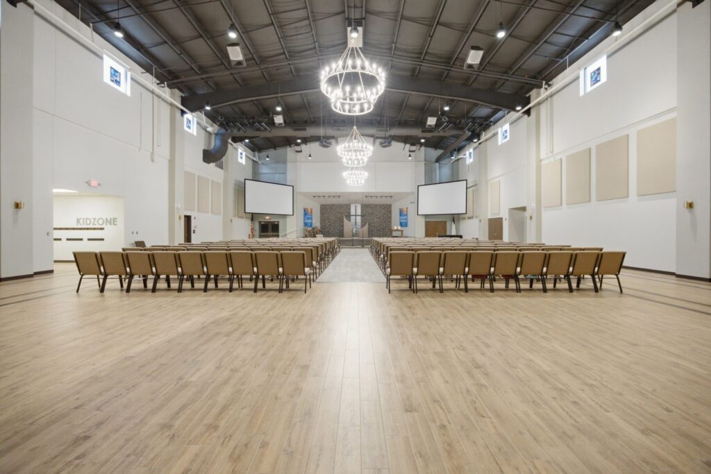 Sanctuary interior with chandelier and centre aisle