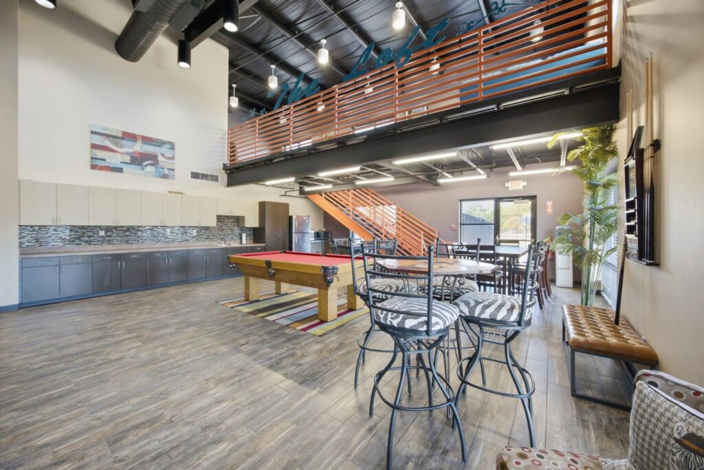 The Loft youth room with pool table and cafe seating