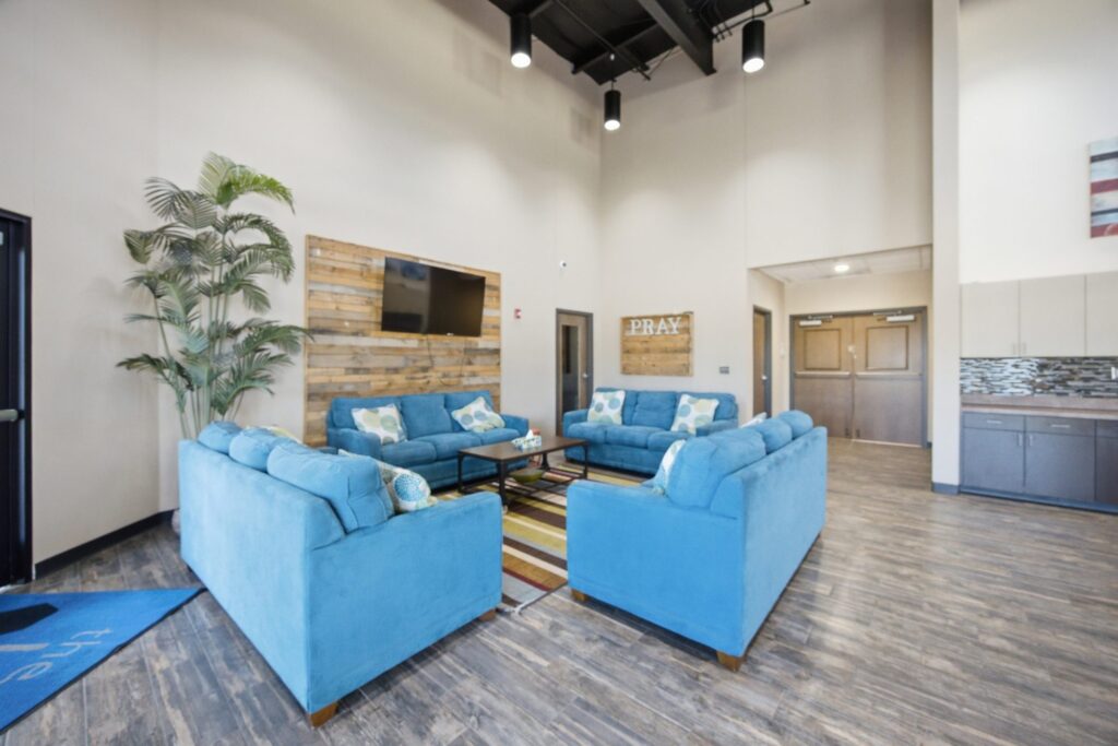 The Loft lounge with sofas and television
